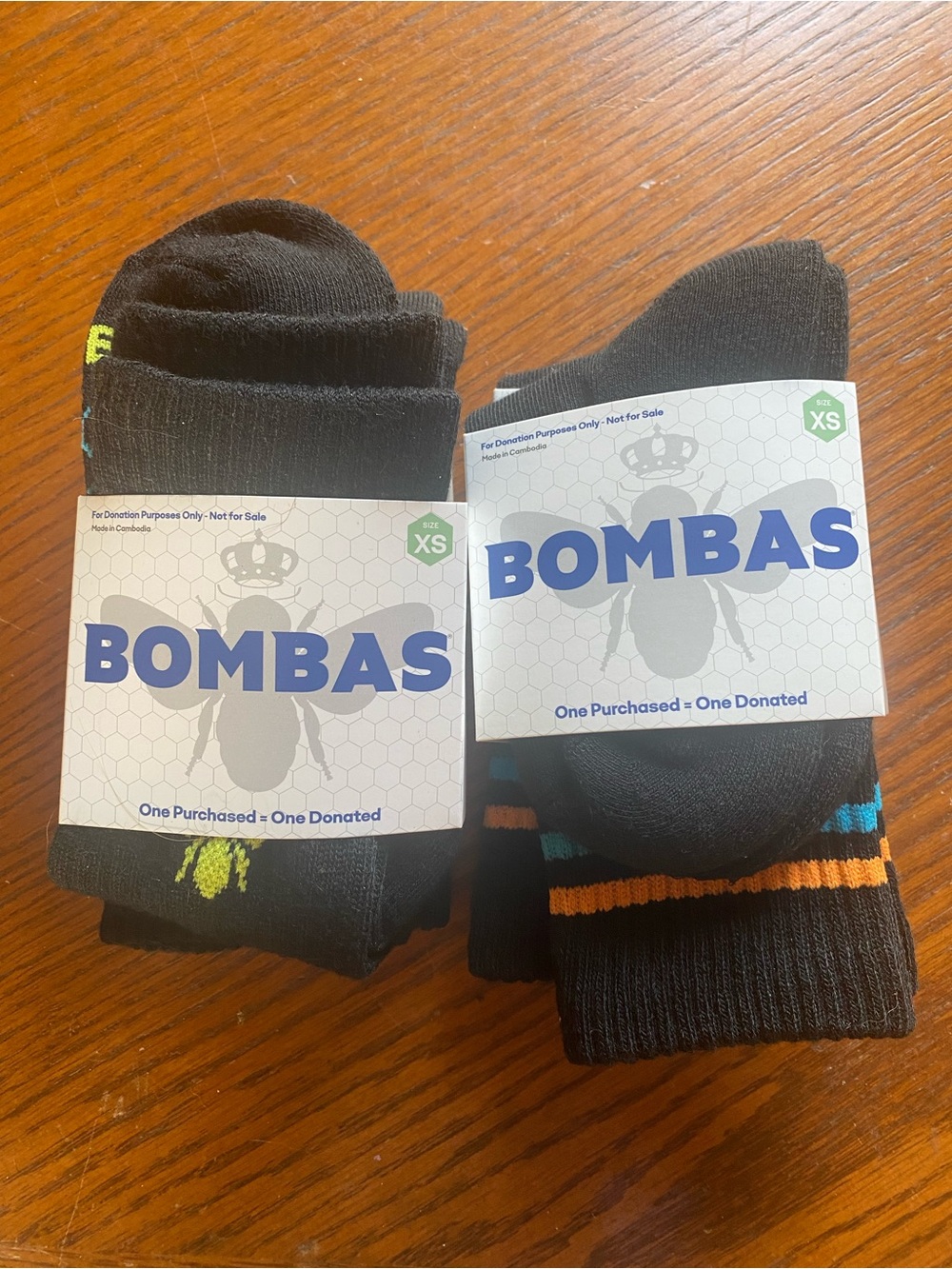 Bombas Black Crew Socks with Orange and Teal Accent Stripes - 4 pair (XS)